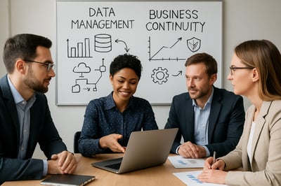 Consulting team collaborating on data management and business continuity solutions Consulting team collaborating on data management and business continuity solutions